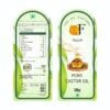 Back label of The Oil Factory Castor Oil showing usage instructions, manufacturing details in Tirupur, and FSSAI logo.